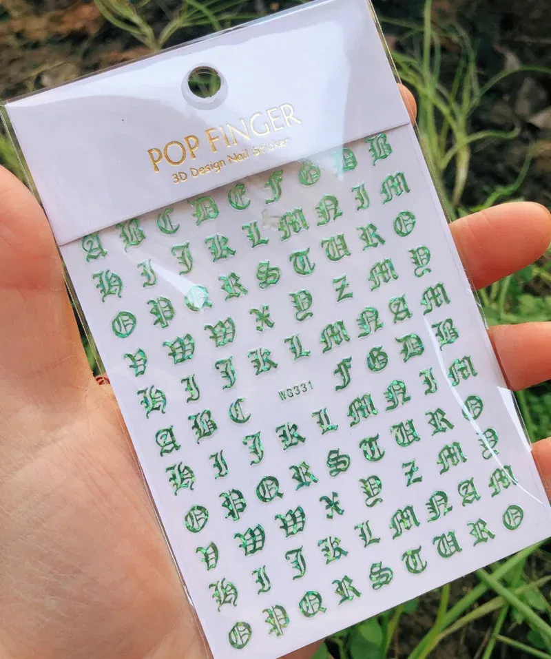 Color: light yellow - 1PCS New English Alphabet Nail Stickers Multi-Color Laser Reflective Nail Slider Art Cool Text Nail Kit