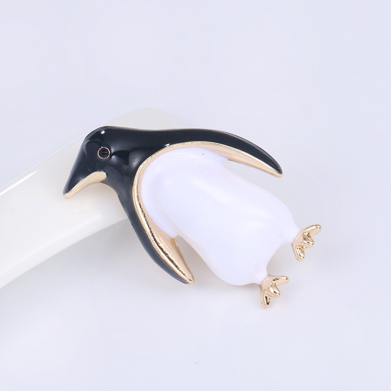 Penguin pin corsage