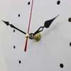 Nordic cat with wagging tail wall clock