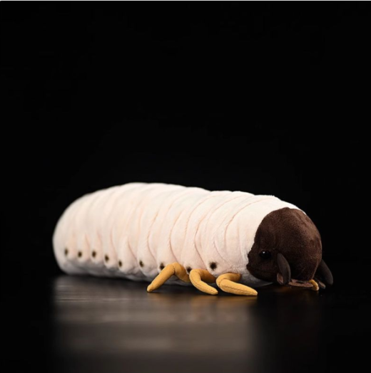 Stuffed Animals Simulating Chickens And Worms