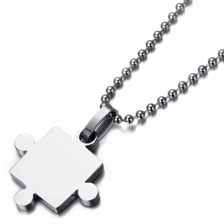 Glossy puzzle couple pendant