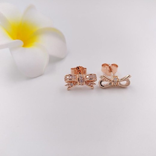 Rose gold bow stud earrings