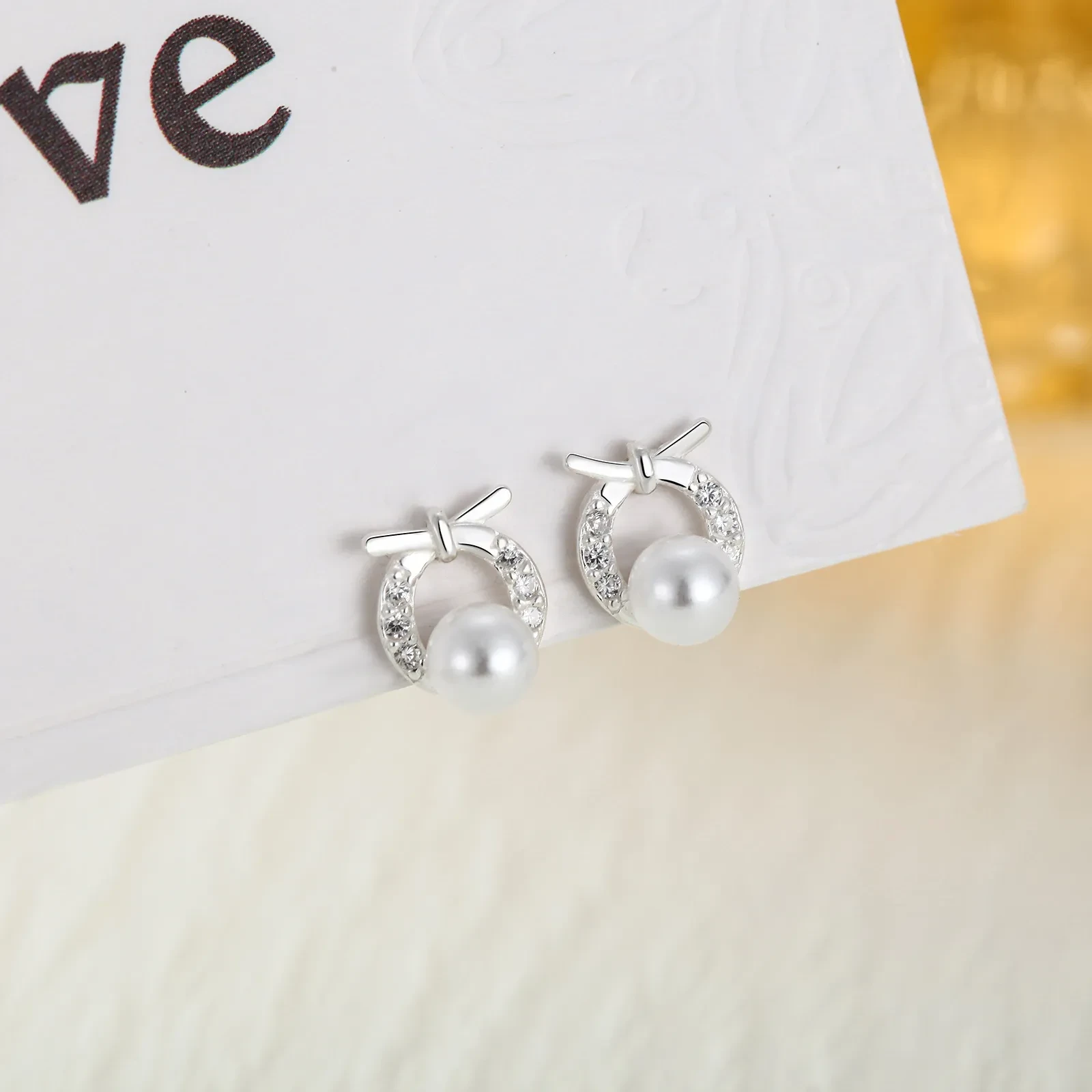 Women's Hollow S999 Sterling Silver Round Bow Stud Earrings