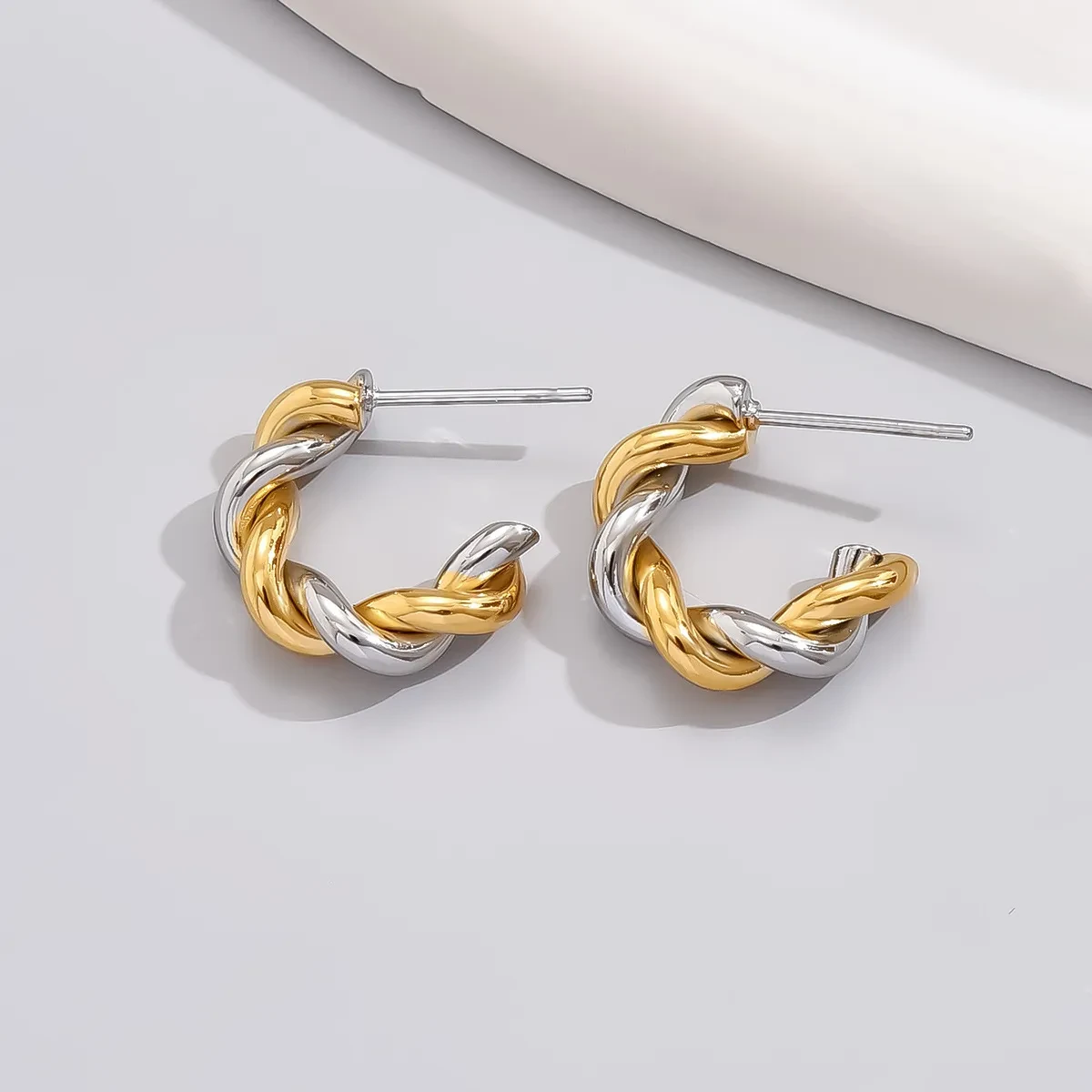 E04 New Classic Mini Twist Fashionable Earrings